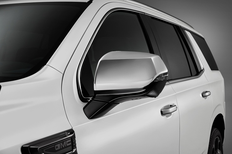 Removing the Mirror Glass During Rearview Mirror Housing Cover Installation